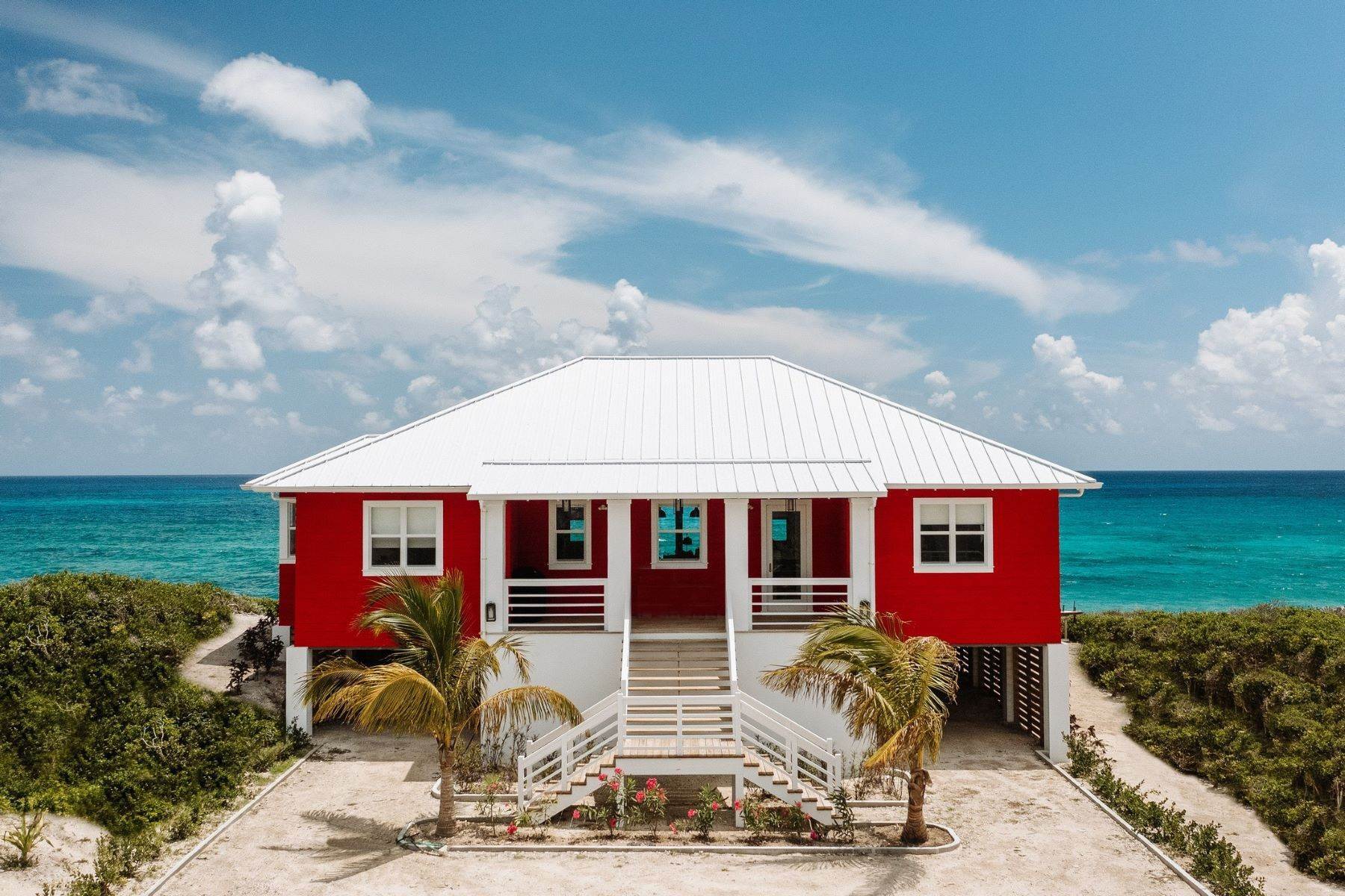 Single Family Homes por un Venta en Dolphin Beach Estates, Guana Cay, Abaco, Bahamas